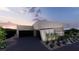 Modern home exterior with clean lines and desert landscaping at 1504 Pleasant Bay Ct, Henderson, NV 89011