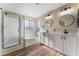 Elegant bathroom with double vanity, soaking tub, and shower at 1512 Groom Ave, North Las Vegas, NV 89081