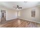 Bedroom with ceiling fan and access to the hallway at 1512 Groom Ave, North Las Vegas, NV 89081