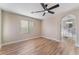 Bright bedroom includes ceiling fan and en-suite bathroom at 1512 Groom Ave, North Las Vegas, NV 89081