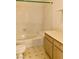 Bathroom with a bathtub and tiled walls at 1900 N Torrey Pines Dr # 132, Las Vegas, NV 89108