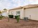 Side view of house, showing landscaping and AC unit at 1900 N Torrey Pines Dr # 132, Las Vegas, NV 89108