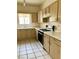 Kitchen with wood cabinets and gas range at 1900 N Torrey Pines Dr # 132, Las Vegas, NV 89108