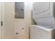 Stackable washer and dryer in a small laundry closet at 200 W Sahara Ave # 2806, Las Vegas, NV 89102