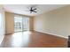 Spacious living room with hardwood floors and access to a balcony at 200 W Sahara Ave # 2806, Las Vegas, NV 89102