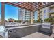 Outdoor kitchen and grilling area with views of building amenities at 200 W Sahara Ave # 2806, Las Vegas, NV 89102