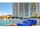 Resort-style pool with lounge chairs and building view at 200 W Sahara Ave # 2806, Las Vegas, NV 89102