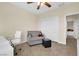 Bedroom with built-in desk and comfortable seating area at 2214 Brighton Point Ave, Henderson, NV 89044