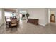 Formal dining room with tile floors and views to living area at 2214 Brighton Point Ave, Henderson, NV 89044