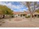 Backyard with patio and gravel landscaping at 2400 Stadler Ct, Las Vegas, NV 89134