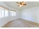 Bright bedroom with carpet flooring and ceiling fan at 2400 Stadler Ct, Las Vegas, NV 89134