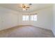 Well-lit bedroom with double closets and ceiling fan at 2400 Stadler Ct, Las Vegas, NV 89134