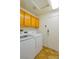 Laundry room with washer, dryer, and cabinets at 2400 Stadler Ct, Las Vegas, NV 89134