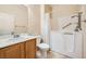 Bathroom with walk-in shower and accessible features at 2551 Darda St, Henderson, NV 89044