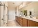 Double vanity bathroom with a large shower at 2551 Darda St, Henderson, NV 89044