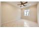 Bright bedroom with ceiling fan and large window at 2551 Darda St, Henderson, NV 89044