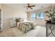 Spacious bedroom with a queen-size bed and neutral decor at 2551 Darda St, Henderson, NV 89044