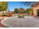 Circular community patio with seating and landscaping at 2551 Darda St, Henderson, NV 89044