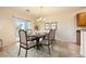 Formal dining room with a chandelier and seating for six at 2551 Darda St, Henderson, NV 89044