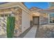 Inviting front entry with stone accents and a walkway to the front door at 2551 Darda St, Henderson, NV 89044