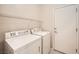 Laundry room with washer, dryer, and storage at 2551 Darda St, Henderson, NV 89044