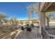 Cozy patio with seating area and view of the surrounding landscape at 2551 Darda St, Henderson, NV 89044