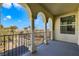 Spacious balcony with arched entryway and city views at 2555 Hampton Rd # 4302, Henderson, NV 89052