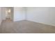 Simple bedroom with carpet and access to bathroom at 2555 Hampton Rd # 4302, Henderson, NV 89052