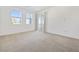 Spacious bedroom with neutral carpeting and private balcony at 2555 Hampton Rd # 4302, Henderson, NV 89052