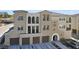 Three-story building with three-car garage and Spanish-style architecture at 2555 Hampton Rd # 4302, Henderson, NV 89052