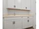 Laundry room with cabinets and countertop at 2555 Hampton Rd # 4302, Henderson, NV 89052