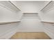 Large walk-in closet with ample shelving and hanging rods at 2555 Hampton Rd # 4302, Henderson, NV 89052