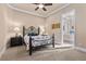 Charming bedroom with an ornate bed frame and ensuite bathroom at 2575 Grassy Spring Pl, Las Vegas, NV 89135