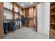 Large walk-in closet with ample shelving and hanging space at 2575 Grassy Spring Pl, Las Vegas, NV 89135