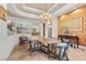 Formal dining room with elegant chandelier and custom wall decor at 2575 Grassy Spring Pl, Las Vegas, NV 89135