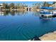 Tranquil lake view with boats and bridge in background at 2625 Seashore Dr, Las Vegas, NV 89128