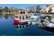 Red boat and other watercraft docked at the lakefront at 2625 Seashore Dr, Las Vegas, NV 89128