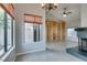 Bright dining area with large windows and fireplace at 2714 Bridgepointe Dr, Las Vegas, NV 89121