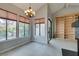 Sunlit dining area featuring built-in shelving and fireplace at 2714 Bridgepointe Dr, Las Vegas, NV 89121