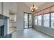 Bright dining room with sliding glass doors and chandelier at 2714 Bridgepointe Dr, Las Vegas, NV 89121