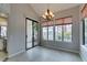 Dining area with patio access and large windows at 2714 Bridgepointe Dr, Las Vegas, NV 89121