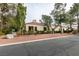 Single story home with red tile roof and desert landscaping at 2714 Bridgepointe Dr, Las Vegas, NV 89121