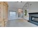 Spacious living room with a built-in bookcase and fireplace at 2714 Bridgepointe Dr, Las Vegas, NV 89121