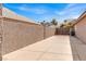 Spacious backyard with large concrete patio and gated access at 278 Iron Duke Ave, Las Vegas, NV 89183