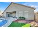 Covered patio overlooks the pool and spa at 278 Iron Duke Ave, Las Vegas, NV 89183