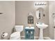 Clean bathroom with pedestal sink and tiled floor at 278 Iron Duke Ave, Las Vegas, NV 89183