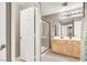 Bathroom with a single sink vanity and a walk-in shower at 278 Iron Duke Ave, Las Vegas, NV 89183