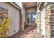 Charming entryway with stone accents and a stylish double door at 278 Iron Duke Ave, Las Vegas, NV 89183