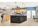 Spacious kitchen featuring an island, ample cabinetry, and stainless steel appliances at 278 Iron Duke Ave, Las Vegas, NV 89183