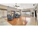 Living room with hardwood floors and large windows at 278 Iron Duke Ave, Las Vegas, NV 89183